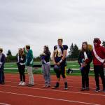 Homecoming royalty pose after being crowned at the Homer vs. Nikiski junior varsity football game on Saturday, Oct. 2, 2021, at Homer High School. From left to right are freshman class Lady Caitlyn Rogers and Lord Caleb Brow; sophomore class Duchess Minadora Reutov and Duke Camden Wise; junior class Prince Charles Van Mete and Princess Brooke Shafer, and senior class Homecoming Queen Kaylin Anderson and King Kazden Stineff. (Photo by Michael Armstrong/Homer News)