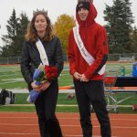 Homecoming Queen Kaylin Anderson, left, and King Kazden Stineff pose after being crowned at the Homer vs. Nikiski junior varsity football game on Saturday, Oct. 2, 2021, at Homer High School. (Photo by Michael Armstrong/Homer News)