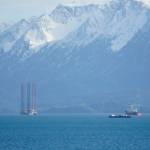 The jack-up rig Randolph Yost, left, awaits loading on the heavy-lift vessel Falcon on Sunday, Oct. 3, 2021, in Kachemak Bay near Homer, Alaska. (Photo by Michael Armstrong/Homer News)