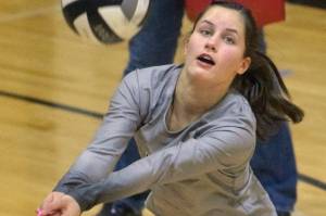 Nikiski's Savanna Stock receives serve against Anchorage Christian Schools on Friday, Oct. 1, 2021, at Nikiski High School in Nikiski, Alaska. (Photo by Jeff Helminiak/Peninsula Clarion)