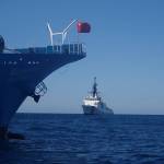 Courtesy photo / U.S. Coast Guard
Crews aboard U.S. Coast Guard Cutter Bertholf prepare to board a fishing vessel flying the flag of the Peoples Republic of China in the North Pacific on Sep. 21, 2021.