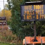 An electronic sign o the Sterling Highway reminds people to vote on Tuesday, Oct. 2, 2021, in Homer, Alaska. (Photo by Michael Armstrong/Homer News)