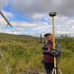 Photo by Angelica Smith/FWS 
Frannie Nelson collecting ground validation data for her undergraduate thesis in the Caribou Hills.