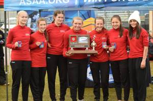 The Kenai Central High School womens cross country team finishes in second place with 58 points at Bartlett High School in Anchorage, Alaska on Saturday, Oct. 9, 2021. (Camille Botello/Peninsula Clarion)