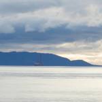The Falcon heavy-lift vessel carrying the jack-up rig Randolph Yost left Kachemak Bay on Monday afternoon, Oct. 25. (Photo by Sarah Knapp/Homer News)