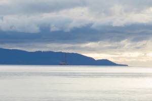 The Falcon heavy-lift vessel carrying the jack-up rig Randolph Yost left Kachemak Bay on Monday afternoon, Oct. 25. (Photo by Sarah Knapp/Homer News)