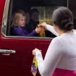 Homer Thrift employees pass out candy during the Haven House Halloween drive-thru Sunday, Oct. 31. (Photo by Sarah Knapp/Homer News)