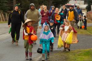 Lions and tigers and bears, oh my! Creatures of all kinds head down Bayview Avenue in search of candy and treats on Halloween. (Photo by Sarah Knapp/Homer News)