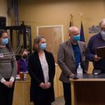 Mayor Ken Castner thanks South Peninsula Hospital health care workers for their dedicated service to the community during the COVID-19 pandemic. The recognition was accepted by Derotha Ferraro, Dr. Christy Tuomi and Ryan Smith. (Photo by Sarah Knapp/Homer News)
