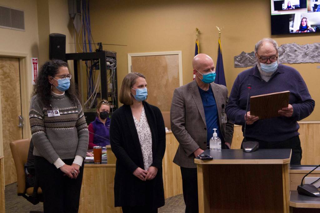 Mayor Ken Castner thanks South Peninsula Hospital health care workers for their dedicated service to the community during the COVID-19 pandemic. The recognition was accepted by Derotha Ferraro, Dr. Christy Tuomi and Ryan Smith. (Photo by Sarah Knapp/Homer News)