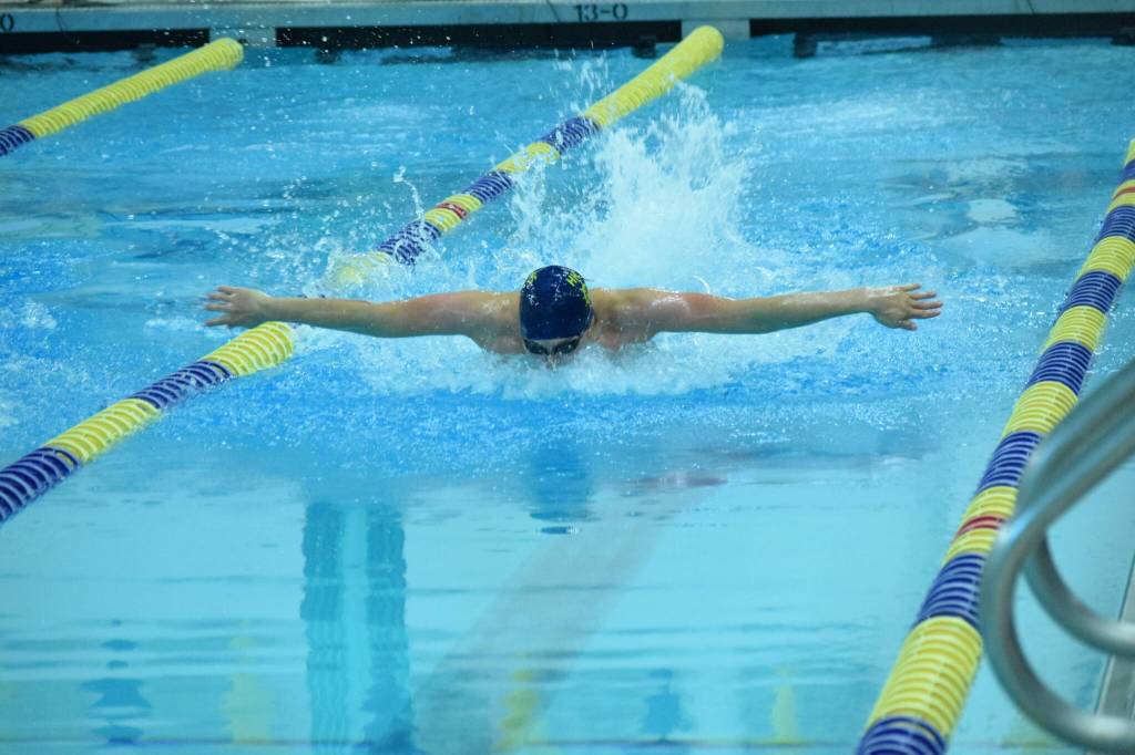 Homers Skyler Rodriguez competes in the state swimming finals at Bartlett High School in Anchorage on Saturday, Nov. 6, 2021. (Camille Botello/Peninsula Clarion)