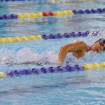 Homers Jillian Crooks competes in the state swimming finals at Bartlett High School in Anchorage on Saturday, Nov. 6, 2021. (Camille Botello/Peninsula Clarion)