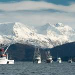 More than 30 boats and 300 people gathered Sunday, Nov. 7, 2021, at Homer’s Seafarer’s Memorial to give a fisherman’s send off for local charter captain Josh Brooks. Brooks, 45, died of a sudden heart attack in Mexico on Oct. 11, 2021, while on vacation at a fishing tournament there. A long-time charter captain and commercial fisherman, Brooks ran his boat, the Huntress, year-round, targeting halibut and salmon. Boat captains fired off expired distress flares and radioed Josh as “missing” in the community’s farewell to a well-loved son. (Photo by Jim Lavrakas)