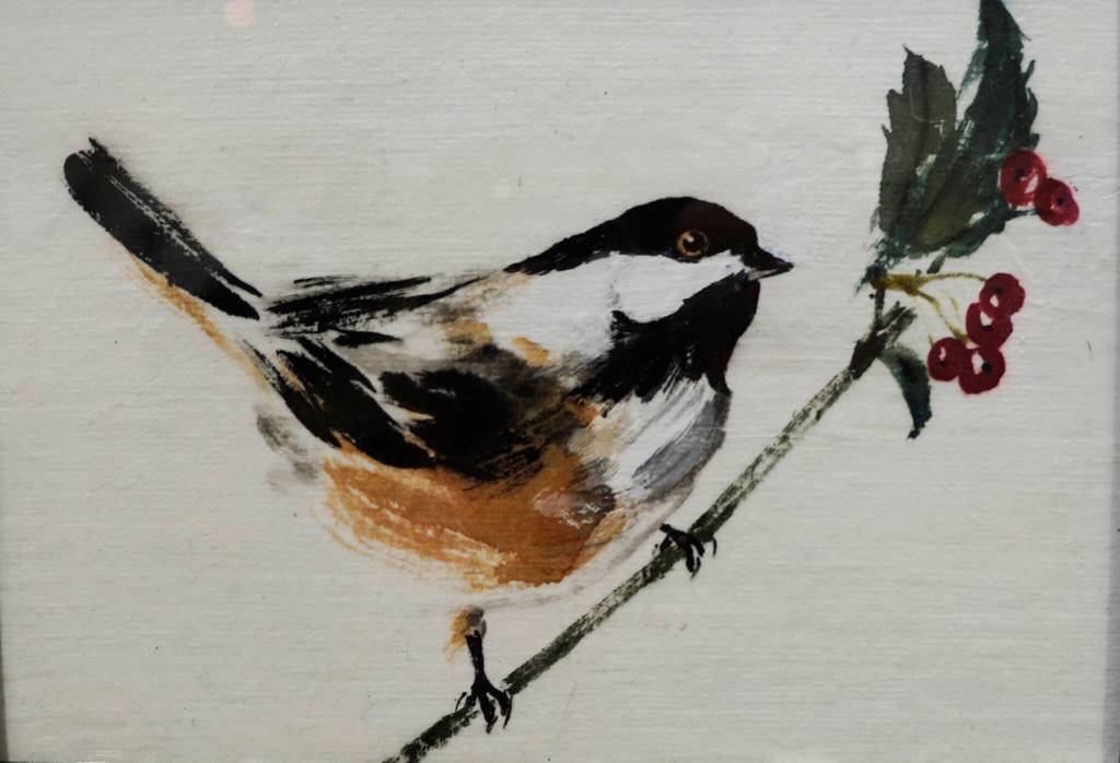 Sharlene Clines Black-capped Chickadee and Holly is one of the works showing in the Homer Council on the Arts Fun wtih 5x7 show through Dec. 22, 2021, at the gallery in Homer, Alaska. (Photo by Michael Armstrong/Homer News)
