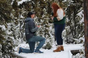 Michael proposes to Sarah at the Kenai National Wildlife Refuge on Sunday, Nov. 7, 2021. (Photo by Ashlyn OHara/Peninsula Clarion)