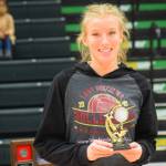 Homers Gracie Gummer wins the outstanding hitter award at the end of the 3A state volleyball championships at the Alaska Airlines Center in Anchorage on Saturday, Nov. 13, 2021. (Camille Botello/Peninsula Clarion)