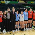 The all-team is announced at the end of the 3A state volleyball championships at the Alaska Airlines Center in Anchorage on Saturday, Nov. 13, 2021. (Camille Botello/Peninsula Clarion)
