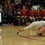 Kenai libero Valerie Villegas dives for a ball during the 3A state volleyball championship game at the Alaska Airlines Center in Anchorage on Saturday, Nov. 13, 2021. (Camille Botello/Peninsula Clarion)