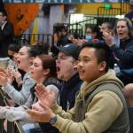 The Kenai crowd cheers on the Kardinals during the 3A state volleyball championship game at the Alaska Airlines Center in Anchorage on Saturday, Nov. 13, 2021. (Camille Botello/Peninsula Clarion)