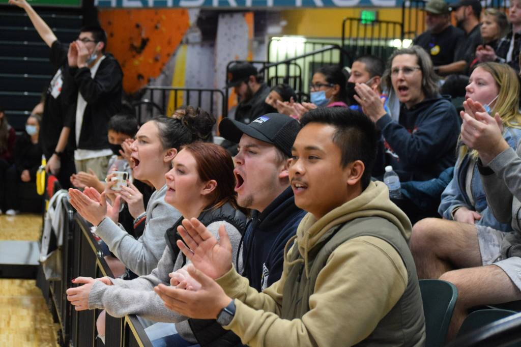 The Kenai crowd cheers on the Kardinals during the 3A state volleyball championship game at the Alaska Airlines Center in Anchorage on Saturday, Nov. 13, 2021. (Camille Botello/Peninsula Clarion)