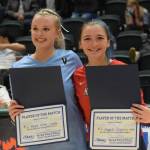 Valdezs Masen Holmes and Kenais Andie Galloway win the players of the match award at the end of the 3A state volleyball championships at the Alaska Airlines Center in Anchorage on Saturday, Nov. 13, 2021. (Camille Botello/Peninsula Clarion)