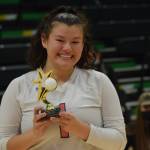 Kenais Valerie Villegas wins the outstanding defensive specialist award at the end of the 3A state volleyball championships at the Alaska Airlines Center in Anchorage on Saturday, Nov. 13, 2021. (Camille Botello/Peninsula Clarion)