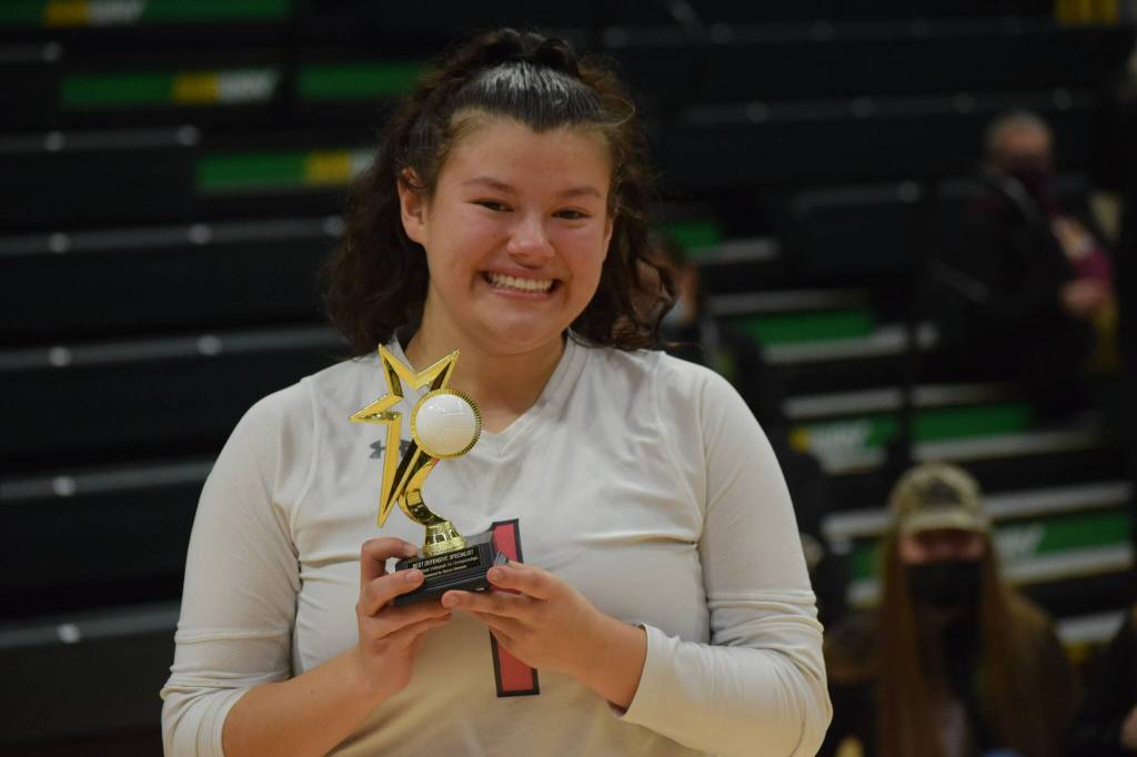 Kenais Valerie Villegas wins the outstanding defensive specialist award at the end of the 3A state volleyball championships at the Alaska Airlines Center in Anchorage on Saturday, Nov. 13, 2021. (Camille Botello/Peninsula Clarion)
