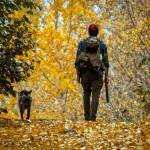 Fall colors, a dog and game in hand make for great outdoor experiences on the Kenai National Wildlife Refuge. (Photo by Colin Canterbury/USFWS)