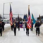 The color guard leads the Veterans Day parade with flags representing each branch of the military, the United States and supportive veterans groups. (Photo by Sarah Knapp/Homer News)