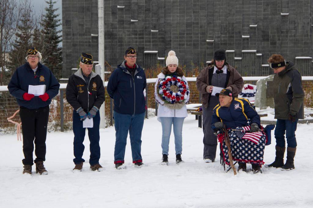 Eileen Faulkner, commander of the American Legion Post 16, addresses the crowd gather for Veterans Day and memorializes the sacrifice and service of all veterans. (Photo by Sarah Knapp/Homer News)