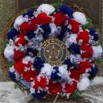 The American Legion Post 16 placed a memorial wreath on the General Buckner Veterans Memorial at Alaska Islands and Ocean Visitor Center during the Veterans Day ceremony on Thursday, Nov. 11. (Photo by Sarah Knapp/Homer News)