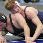 Soldotna junior Liam Babitt holds a grip on South Anchorage’s Britten Hamilton during the 215-pound final of the Lancer Smith Fall Varsity 2021 Invite on Saturday, Nov. 18, 2021 at the Menard Arena in Wasilla, Alaska. (Photo by Jeremiah Bartz/Frontiersman)