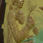 Two characters, a mother and daughter, on the Loved & Lost Memorial Bench are pictured hugging each other. In memory of Duffy Anesha Murnane, who went missing in October 2019, a bunny appears on the little girls hat. (Photo by Sarah Knapp/Homer News)