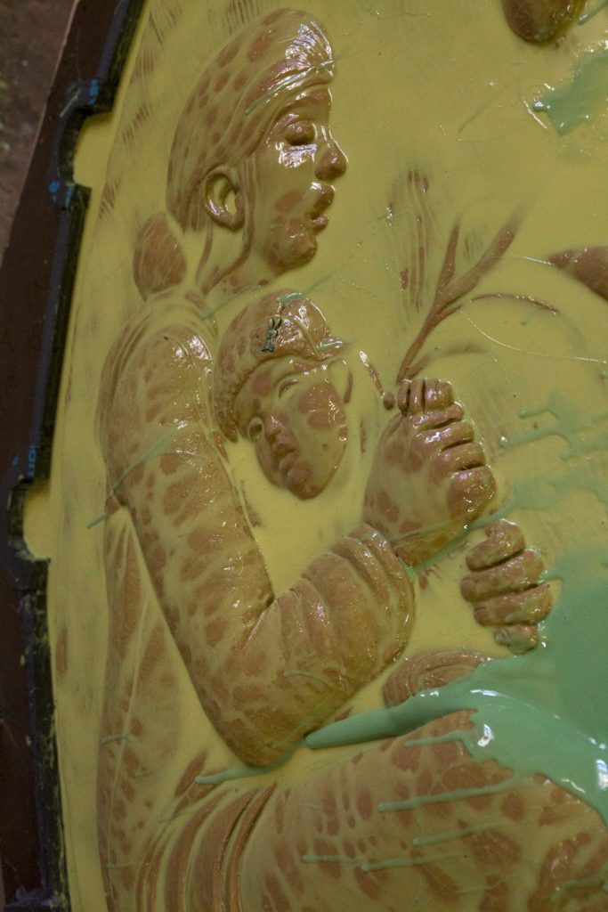 Two characters, a mother and daughter, on the Loved & Lost Memorial Bench are pictured hugging each other. In memory of Duffy Anesha Murnane, who went missing in October 2019, a bunny appears on the little girls hat. (Photo by Sarah Knapp/Homer News)