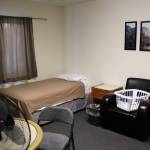 Furniture awaits use in a bedroom at a cold weather shelter set to open next month on Monday, Nov. 22, 2021 in Nikiski, Alaska. (Ashlyn OHara/Peninsula Clarion)