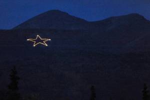 The Joint Base Elmendorf-Richardson star is Illuminated on the side of Mount Gordon Lyon on Wednesday, Sept. 11, 2019, just east of Anchorage, Alaska, in observation of the 18th anniversary of the terrorist attacks. A crew from the base went to light the 300-foot wide holiday star, but found that only half of the stars 350 or so lights were working, the Anchorage Daily News reported. Airmen from the 773rd Civil Engineer Squadron Electrical Shop havent been able to figure out what was wrong and repair the lights, but they plan to work through the week, if necessary, base spokesperson Erin Eaton said. (Bill Roth/Anchorage Daily News via AP)
