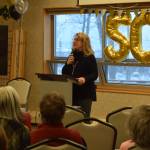 Kathy Romain, the executive director of the Kenai Senior Center, hosts a reception to celebrate the facility's 50 years on Tuesday, Nov. 30, 2021. (Camille Botello/Peninsula Clarion)