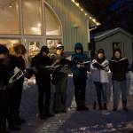 The Homer High School choir entertained the crowd at the Homer Chamber of Commerce holiday tree lighting ceremony with Christmas carols. (Photo by Sarah Knapp/Homer News)