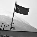 Peter Segall / Juneau Empire file 
This February 2020 file photo shows the Alaska state flag on the bow of the MV Matanuska at the Auke Bay Ferry Terminal. The infrastructure bill recently passed by Congress includes significant funding for the ferry system, but coastal communities are still feeling the pinch of reduced service.