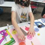 Student Willow Bouman works on a thankful ice cream art project on Monday, Jan. 11, at Fireweed Academy in Homer, Alaska. Under new COVID-19 protocols, students or staff identified as a close contact and who want to return to work or school must wear a face covering for 14 days, remain symptom free and have two negative COVID-19 test results, with the first test taken on the first day after being identified as a close contact or first day of return to school and the second test taken between days five and seven. (Photo courtesy Todd Hindman/Fireweed Academy)