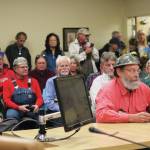 Frtiz Creek area resident Barrett Fletcher gives the invocation before a Tuesday, Sept. 17, 2019 Kenai Peninsula Borough Assembly meeting as a representative of the Church of the Flying Spaghetti Monster at Homer City Hall in Homer, Alaska. (Photo by Megan Pacer/Homer News)