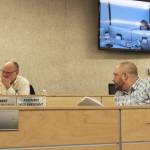 Assembly members Brent Hibbert (left) and Tyson Cox (right) prepare to vote on legislation during a meeting of the Kenai Peninsula Borough Assembly on Tuesday, Dec. 7, 2021 in Soldotna, Alaska. (Ashlyn O'Hara/Peninsula Clarion)