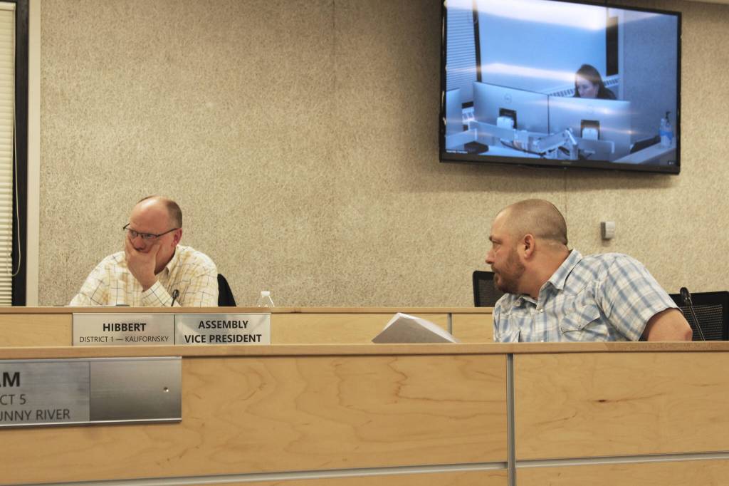 Assembly members Brent Hibbert (left) and Tyson Cox (right) prepare to vote on legislation during a meeting of the Kenai Peninsula Borough Assembly on Tuesday, Dec. 7, 2021 in Soldotna, Alaska. (Ashlyn O'Hara/Peninsula Clarion)