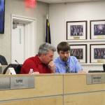 Kenai Peninsula Borough Mayor Charlie Pierce (back) and assembly members Richard Derkevorkian (left) and Jesse Bjorkman (right) particpate in a meeting of the Kenai Peninsula Borough Assembly on Tuesday in Soldotna. (Photo by Ashlyn OHara/Peninsula Clarion)