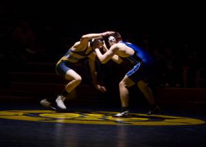 Homer Mariner Nestor Kalugin faces off Soldotna Stars Joe Whittom at 171 during senior night on Nov. 23. Kalugin won the match. (Photo by Sarah Knapp/Homer News)