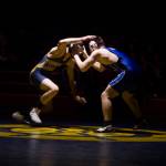 Homer Mariner Nestor Kalugin faces off Soldotna Stars Joe Whittom at 171 during senior night on Nov. 23. Kalugin won the match. (Photo by Sarah Knapp/Homer News)