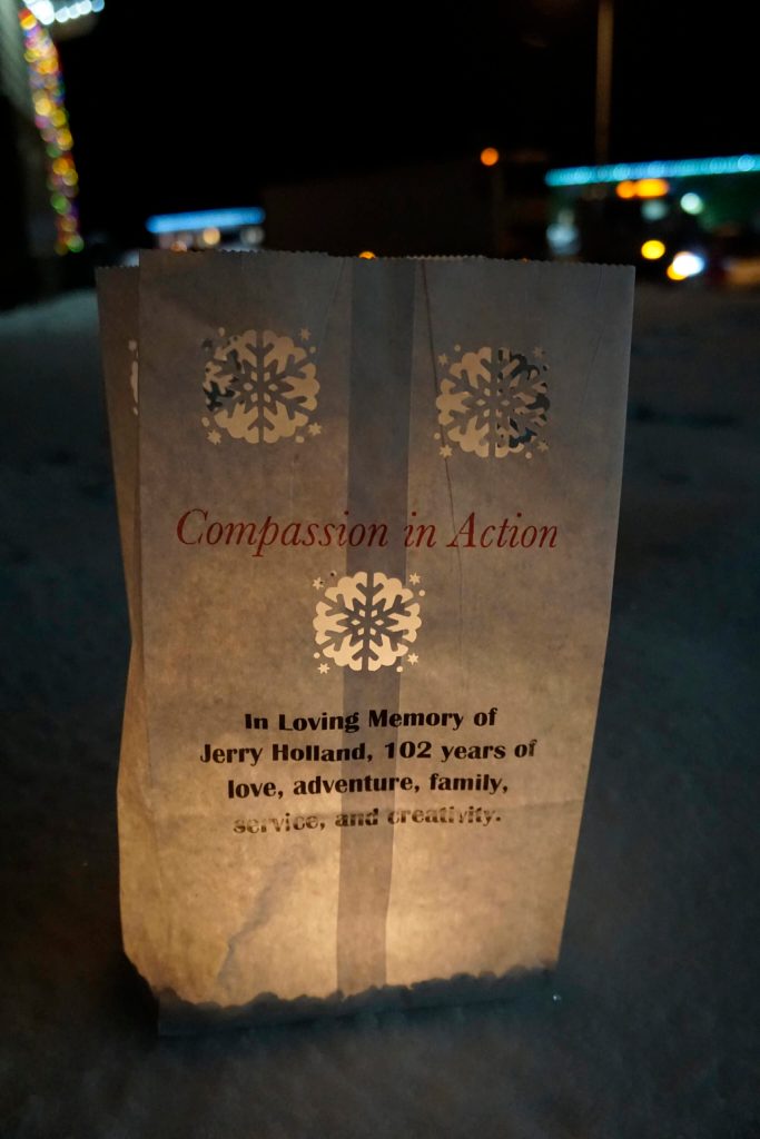 A luminaria honoring Jerry Holland is one of the memorials placed on Thursday, Dec. 16, 2021, for Hospice of Homers LIght Up a Life event at WKFL Park in Homer, Alaska. (Photo by Michael Armstrong/Homer News)