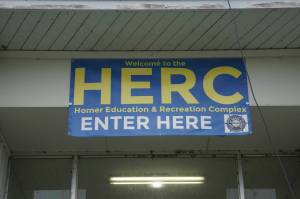 A sign hangs over the entrance to the Homer Education and Recreation Complex on Saturday, Oct. 2, 2021, in Homer, Alaska. (Photo by Michael Armstrong/Homer News)