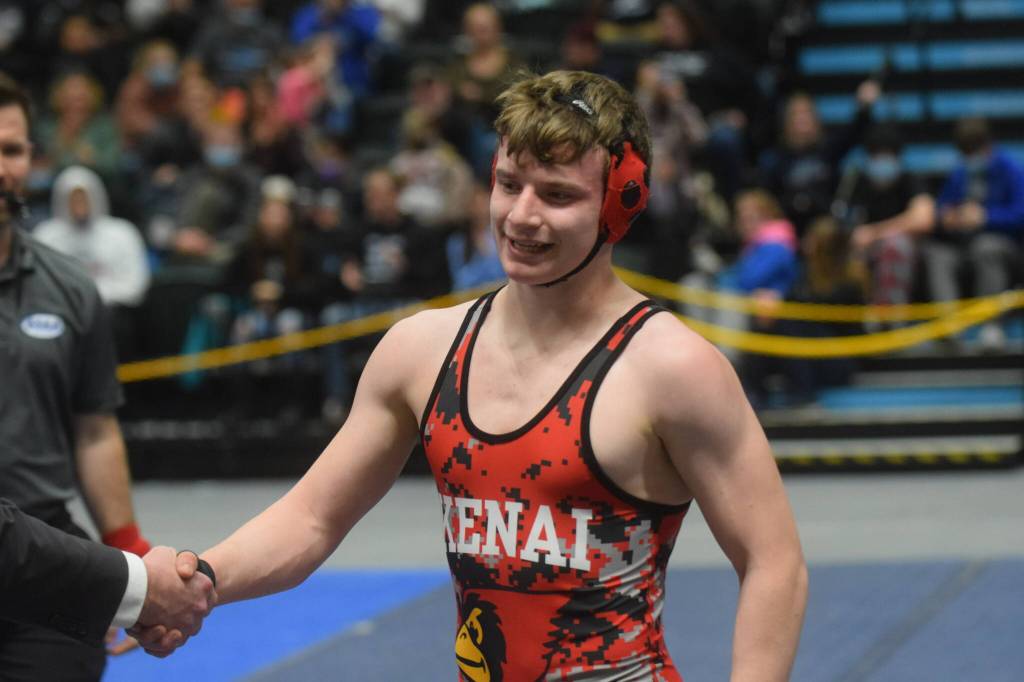 Kenais Andrew Gaethle competes in the Division II state wrestling championship at the Alaska Airlines Center in Anchorage on Saturday, Dec. 18, 2021. (Camille Botello/Peninsula Clarion)