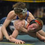 Soldotnas Jacob Strausbaugh competes in the Division I state wrestling championship at the Alaska Airlines Center in Anchorage on Saturday, Dec. 18, 2021. (Camille Botello/Peninsula Clarion)